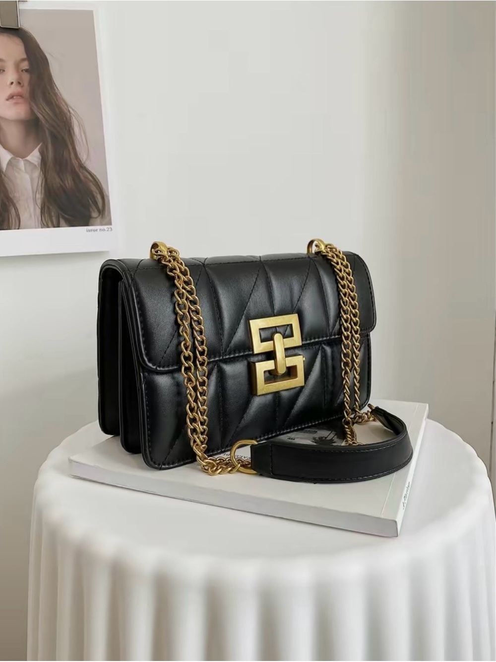 Black Quilted Shoulder Bag with Gold Chain and Logo Accent